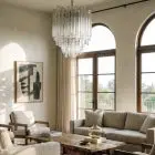 92 transparent triedri prisms chandelier hanging in a livingroom
