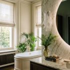 6 felci transparent sconce hanging in bathroom